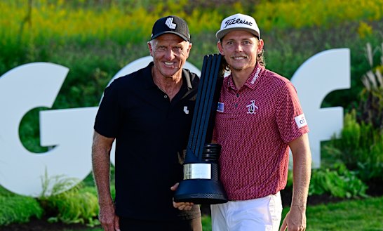 Cameron Smith with LIV Golf chief executive Greg Norman after his win in Chicago.