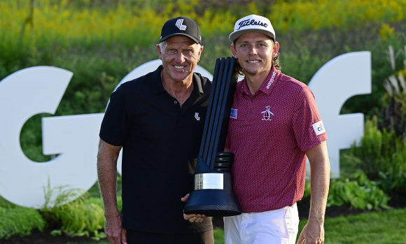 Cameron Smith with LIV Golf chief executive Greg Norman after his win in Chicago.