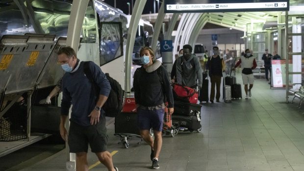Passengers arrive at Sydney airport in September, destined for hotel quarantine.
