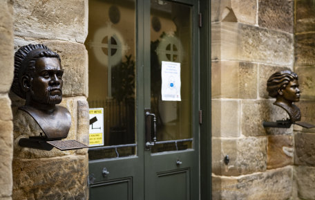Bronze bust of Aboriginal leaders Bennelong (left) and Barangaroo (right) which frame the door at St Patrick’s Catholic Church, The Rocks.