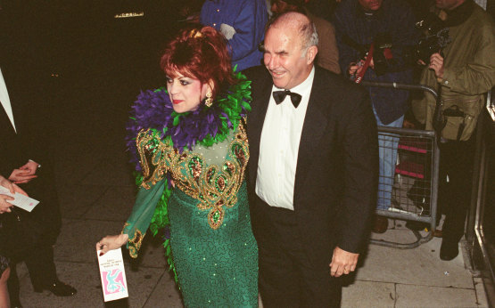 Clive James arrives for the 1995 Comedy Awards with Margarita Pracatan, the Cuban novelty singer who found success in the 1990s when Clive James had her perform live on his TV show. 