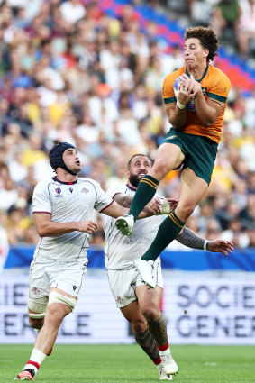 Mark Nawaqanitawase leaps high against Georgia in the Rugby World Cup.