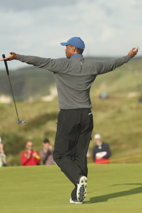 Health in decline: Woods celebrates a birdie at the British Open in July.