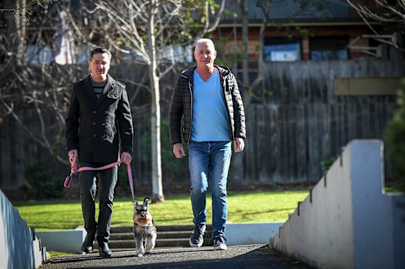 Chris Kabay (left) and his partner, Bruce Facey, researched dog breeds before settling on their schnauzer, Sybil.