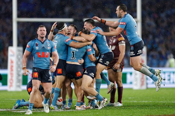 NSW players celebrate the comeback win.