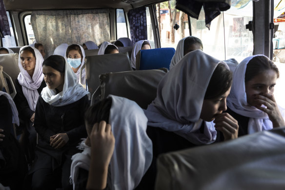 Afghan students from Kabul’s  Zarghoona high school on July 25.  The high school is the largest in Kabul with 8500 female students. There is widespread fear that the Taliban will reintroduce its notorious system barring girls and women from almost all work and access to education.