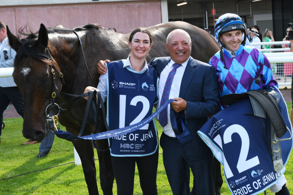 Jockey Declan Bates poses with owner Tony Ottobre and Sammie Waters  after Pride of Jenni’s win in the All Star Mile.