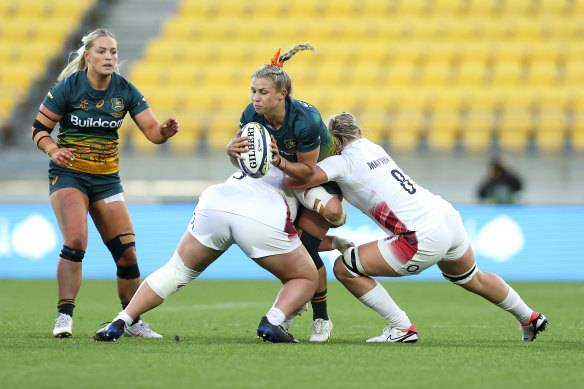 Georgie Friedrichs is tackled in Australia’s loss to England in the WXV1 tournament in New Zealand.