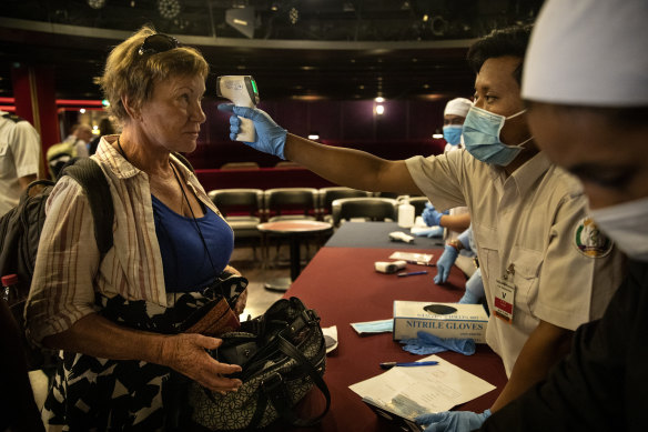 Passengers preparing to disembark the Westerdam gather for a final health screening last week. 