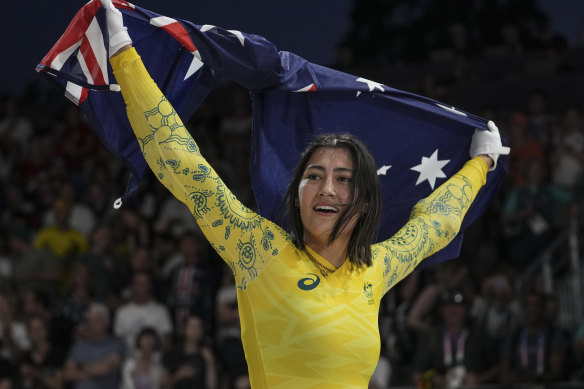 Saya Sakakibara celebrates her gold medal-winning performance.