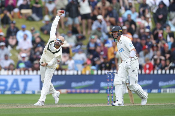 Nathan Lyon sends down a delivery on day three in Wellington. 
