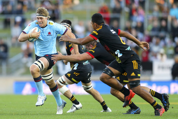 Ned Hanigan carries the ball against the Chiefs.