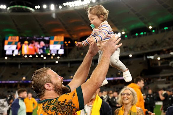 James Slipper of the Wallabies celebrates with his daughter after his final Test. 
