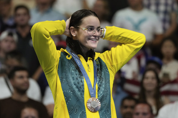 Kaylee McKeown on the podium for the women’s 200m individual medley after receiving her surprise bronze medal.