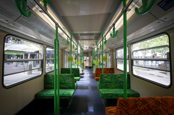 An empty tram travels through the CBD in October.