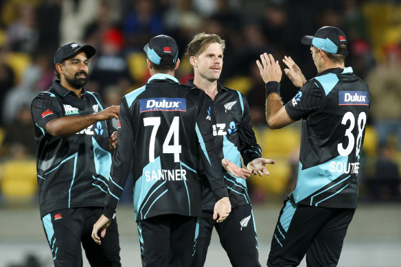 Lockie Fergus of New Zealand celebrates after taking the wicket Glenn Maxwell