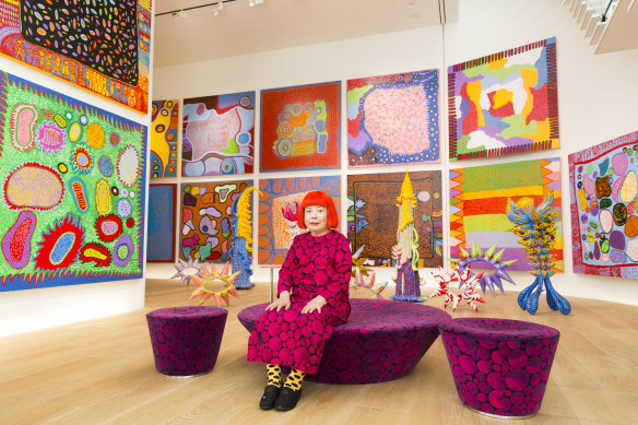 Yayoi Kusama with her recent works in Tokyo, 2016.