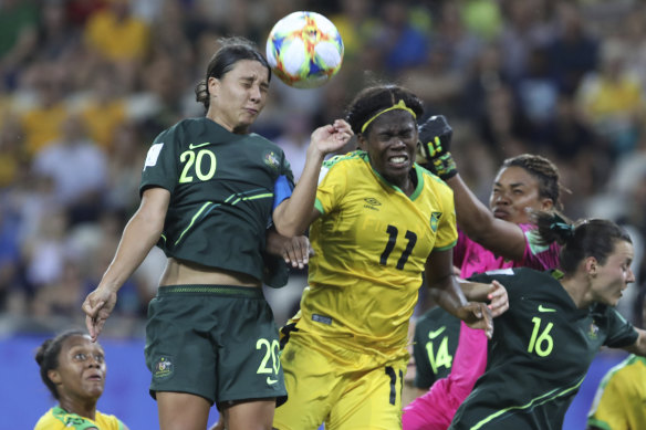 Jamaica’s Khadija Shaw tussles with Same Kerr for the ball.