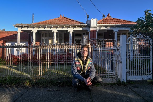 Jordan van den Berg outside unoccupied homes in Brunswick.