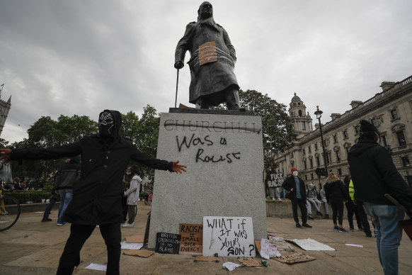 The statue of Winston Churchill in Parliament Square, London on Sunday.