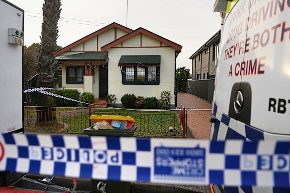 NSW forensic police process the crime scene on Kembla Street.