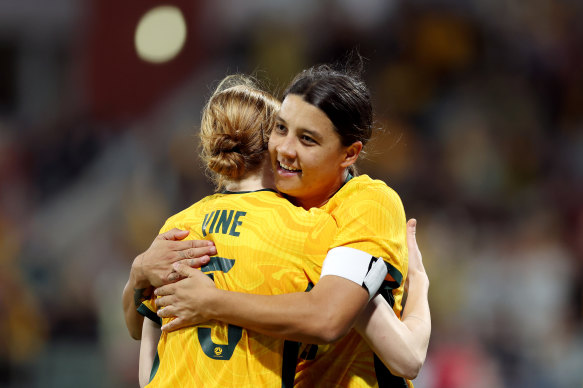 Sam Kerr and Cortnee Vine celebrate after the skipper scores for Australia.