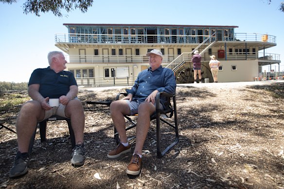 Big dreams: Twins Rohan, left, and Craig Burgess on the banks of the Murray River with their new paddle steamer, Australian Star, whose first paying passengers will board on February 23.