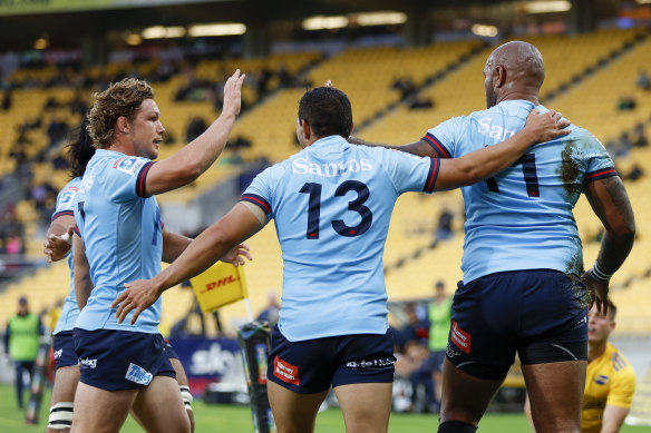 Nadolo is congratulated for scoring.