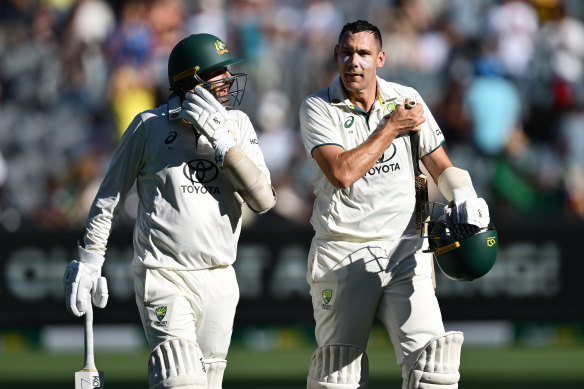 Scott Boland and Nathan Lyon at stumps.