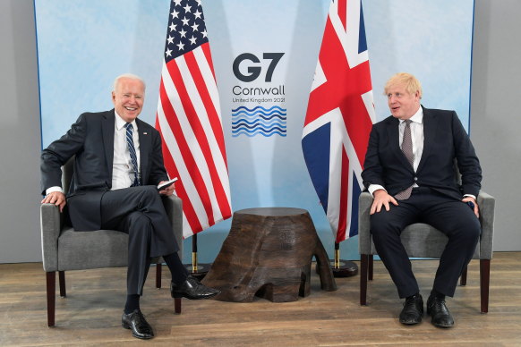 Britain’s Prime Minister Boris Johnson speaks with US President Joe Biden during their meeting, ahead of the G7 summit.