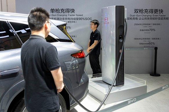 At the BYD showroom, sales reps demonstrated its five-minute fast-charging technology.