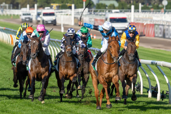 Ethan Brown salutes on Smokin’ Romans after winning the Turnbull Stakes at Flemington.