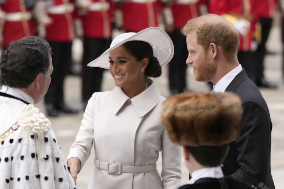 Prince Harry and Meghan, Duchess of Sussex, arrive for a service of thanksgiving for the reign of Queen Elizabeth II at St Paul’s Cathedral in London on Friday.