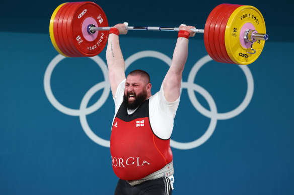 Lasha Talakhadze does the clean and jerk.