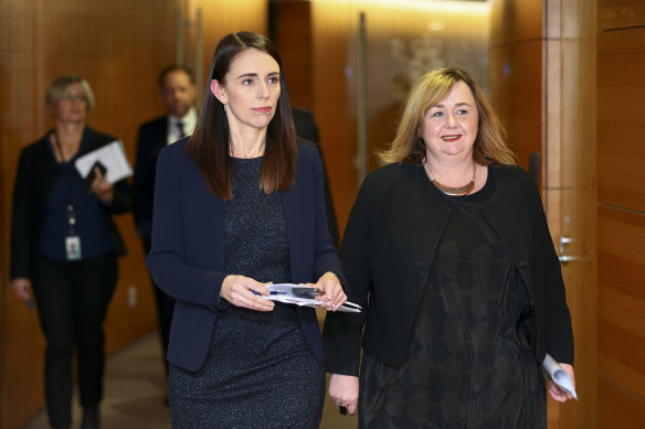 NZ Prime Minister Jacinda Ardern with Megan Woods, the minister overseeing New Zealand's quarantine response.