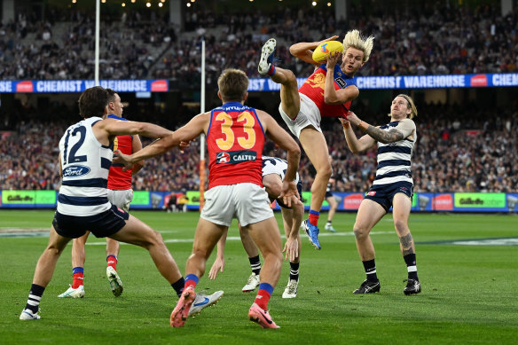 Kai Lohmann of the Lions marks the ball.