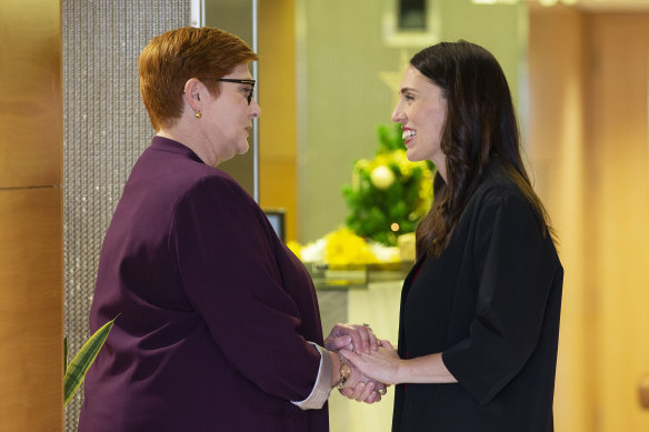 New Zealand Prime Minister Jacinda Ardern greets Foreign Minister Marise Payne at the New Zealand parliament in Wellington on Monday December 16, 2019.
