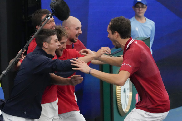  Danill Medvedev celebrates after combining with Roman Safiullin to defeat Italy’s Jannik Sinner and Matteo Berrettini in their deciding doubles clash.