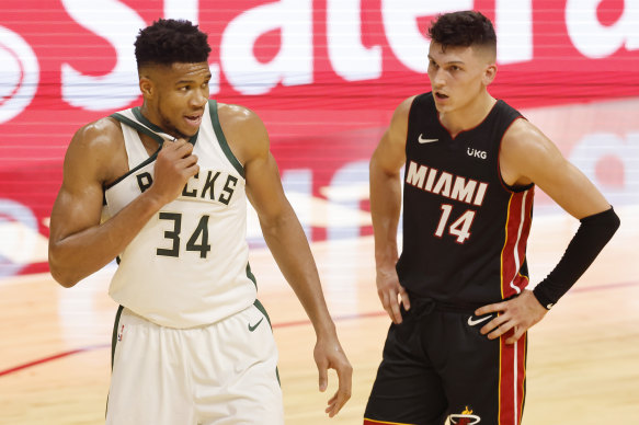Giannis Antetokounmpo, left, had a quiet night compared to some of his teammates. 