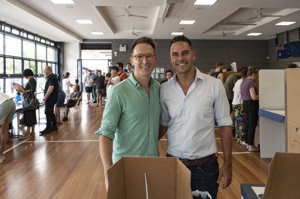 Independent MP for Sydney Alex Greenwich, right, cast his vote in Surry Hills on Saturday with husband Victor Hoeld.