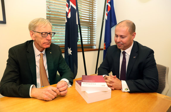 There wasn't a lot of conversation when banking royal commissioner Kenneth Hayne (left) delivered his final report to Treasurer Josh Frydenberg. "A handshake or something ...?" implored a photographer.