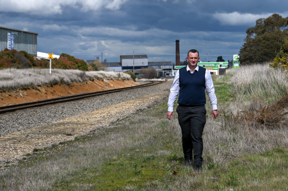 Ballarat Mayor Daniel Moloney next to the location for a new train station opposite Mars Stadium.