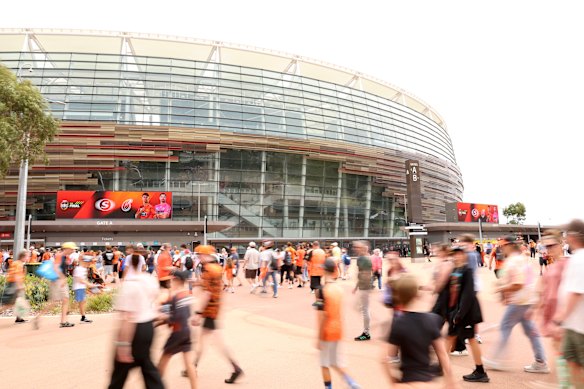 Fans queue up to enter Optus Stadium.