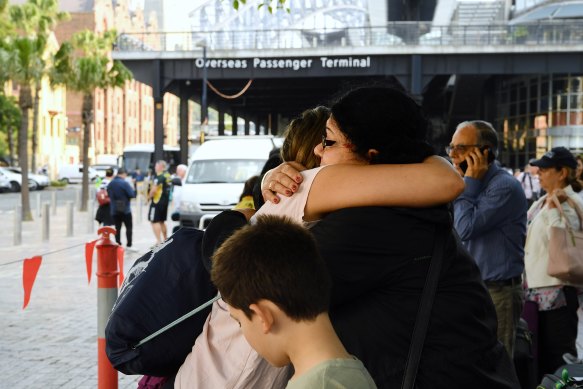 Helen Caudello (right) greets her daughter in law Eleni (left) and grandson Nicholas 8 (centre).