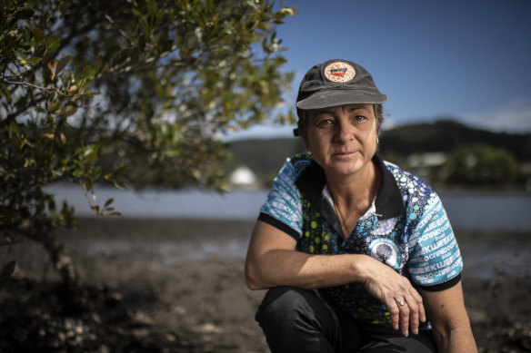 Tracey Howie at a significant Aboriginal rock site near the old Peat Island Asylum.