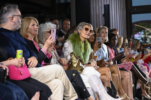 Front-row guests look on at the launch runway event for Melbourne Fashion Week. 