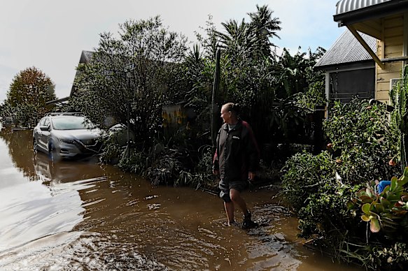 Bennett outside her inundated home.