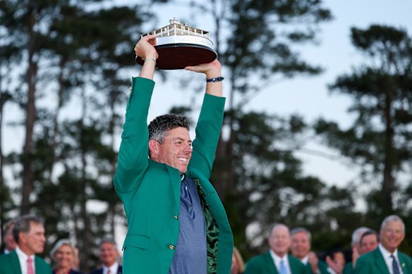 Rory McIlroy poses with the Masters trophy.
