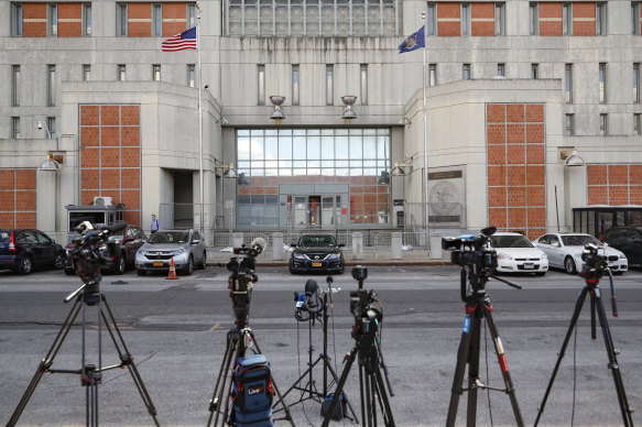 Media outlets set up cameras outside the main entrance of the Metropolitan Detention Centre, Brooklyn, where British socialite Ghislaine Maxwell is held.