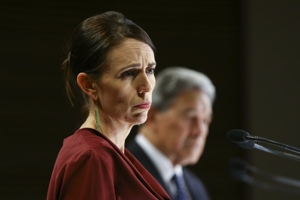 Prime Minister Jacinda Ardern and Deputy Prime Minister Winston Peters speak to media at a press conference following a COVID-19 financial response package announcement at Parliament on Tuesday.